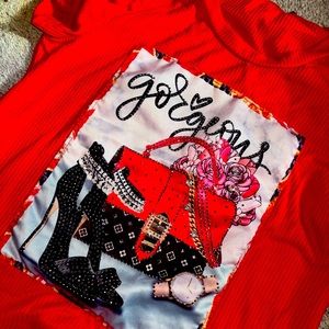 It’s red, black letters, sparkly diamonds, and it has a really nice shine to it!